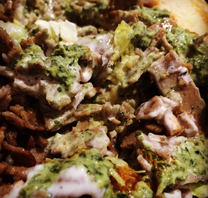 The Chicken & Rice Guys lamb plate with white and green sauce.